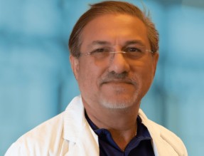 Dr. Din Khanna – Executive Director